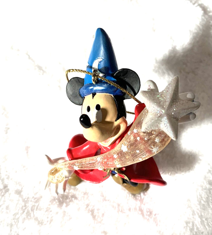 DISNEY'S  SORCERER MICKEY WITH SWEEPNG STAR ACROSS HIS BODY