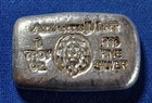 A Atlantis Mint LION- 1 oz .999 Fine Silver Hand Poured Bar