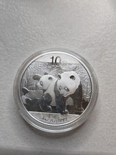 2010 SILVER CHINA 10 YUAN 1 OZ PANDA COIN IN CAPSULE