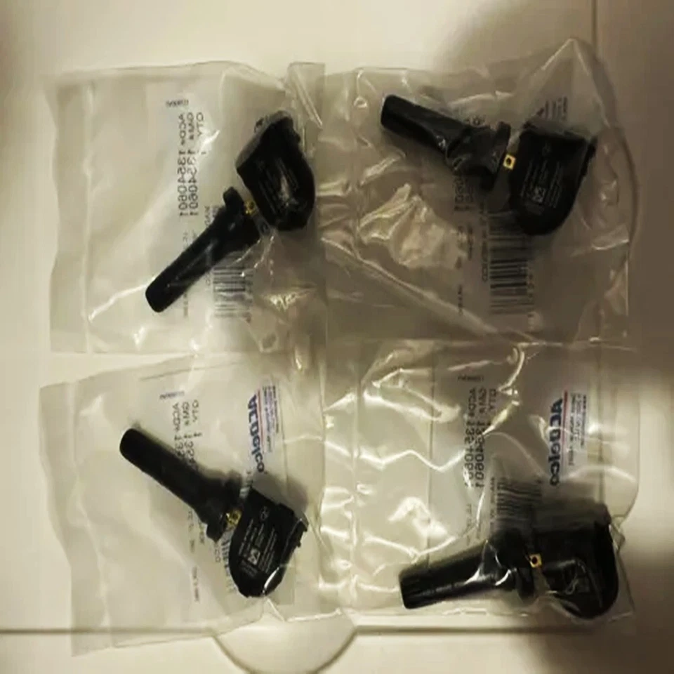 Sensor de presión de neumáticos genuino OEM TPMS 13540601 4 PIEZAS camionetas y furgonetas GMC Foto 3 de 4