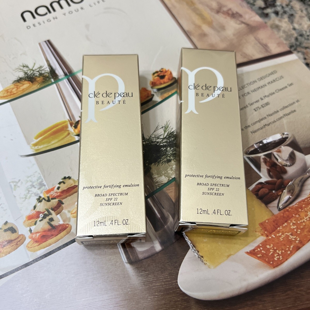 2x Cle De Peau Beaute Protective Fortifying Emulsion SPF 22 - 0.4