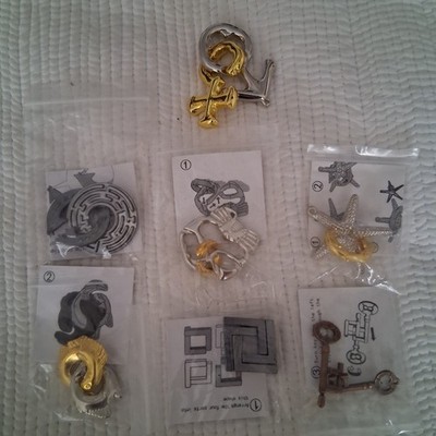 7 different Hanayama Cast Seabream Puzzles Marine Series new in pack
