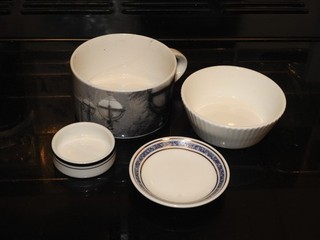 4 older pieces of British Airways china. Includes Concorde butterpat.
