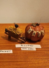 2 Blossom Bucket Figurines: B. Lloyd " Crow/Sunflowers, Pumpkin/Fall"