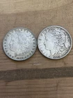 Two 1889 Philadelphia Morgan Silver Dollars