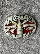VTG 1982 The Great American Buckle Co Mechanic Embossed Spark Plug Belt Buckle