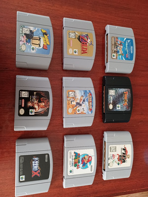 Two Nintendo 64 Controllers, Nine Nintendo 64 Games and Memory Card