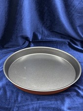Maceta de aluminio con base naranja