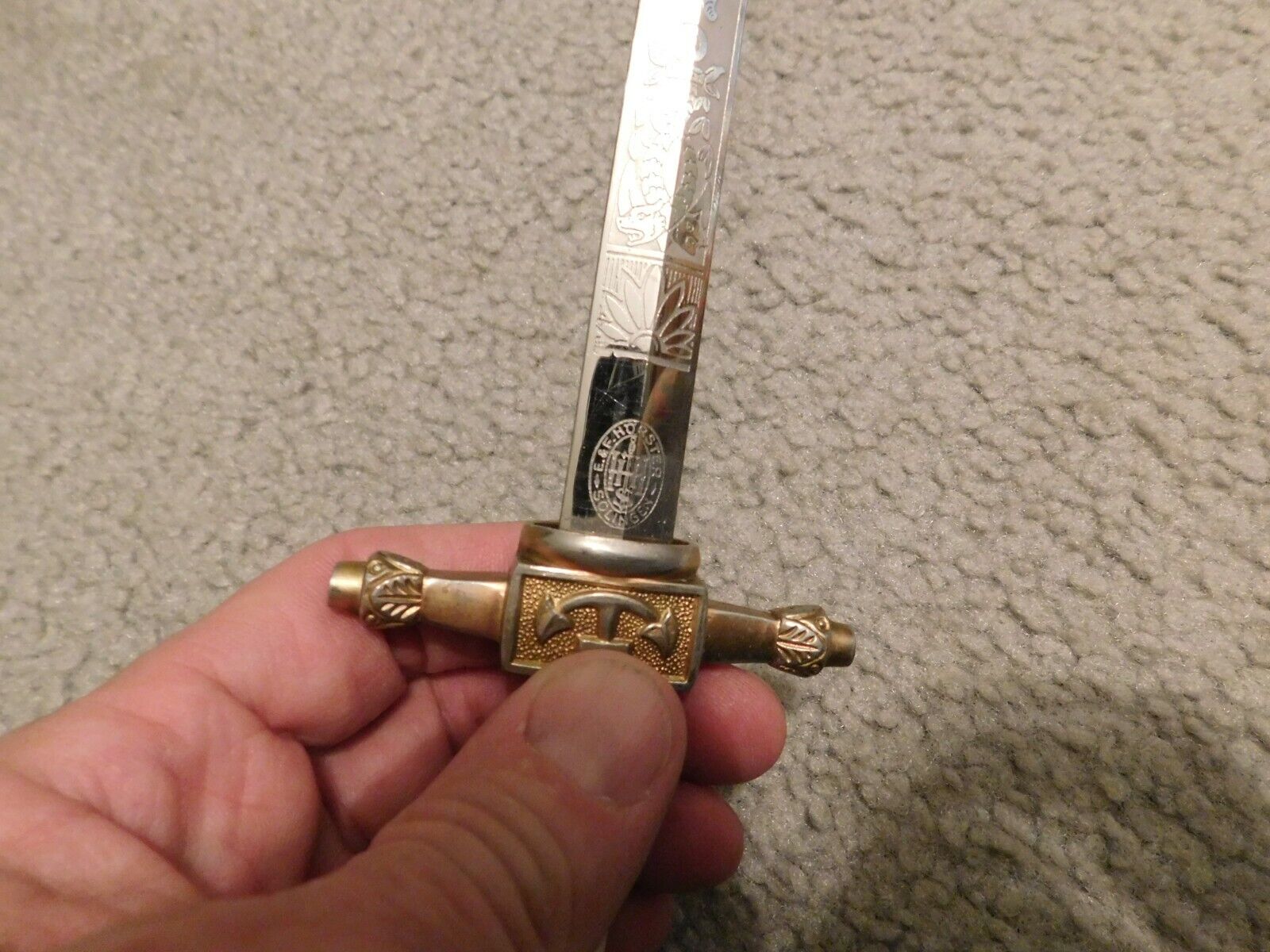 A dagger M 37 for leaders, manufacturer M 7/36, E. & F. Hörster, Solingen  Very good bright blade, the obverse with etched motto Blut und Ehre!  (Blood and Honour!), the reverse etched