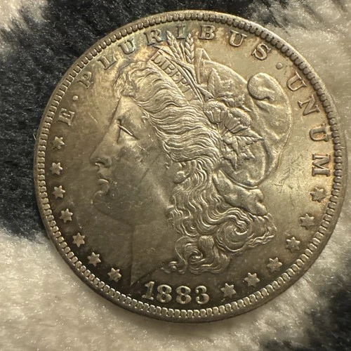 1883O $1 Morgan Silver Dollar BU Rainbow Toning