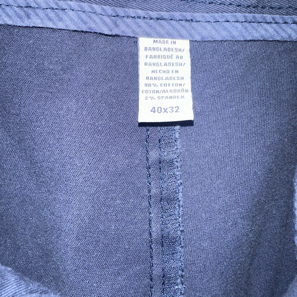 Pantalones chinos IZOD para hombre elásticos de agua salada frente plano talla 40W x 32L azul marino Foto 4 de 4