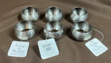 NWT KEMP AND BEATLEY BRUSHED SILVER SET OF 6 NAPKIN RINGS INDIA