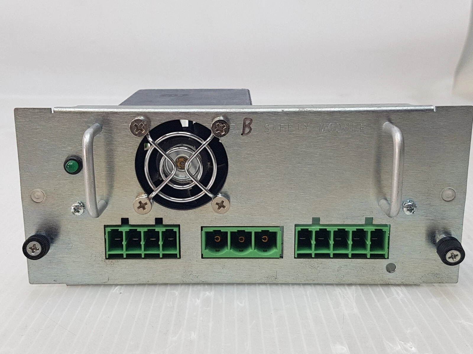 Front panel engraved SAFETY MODULE with fan, green LED and three green terminal blocks
