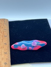 Pink and blue with purple flower barrette
