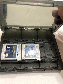 Nintendo 3DS XL Handheld Console With 2015 peanut Games & charger & Case +1 game