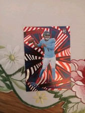 2025 Panini Revolution - Rookies Cameron Ward #205 Red Astro (RC) Titans Rookie 