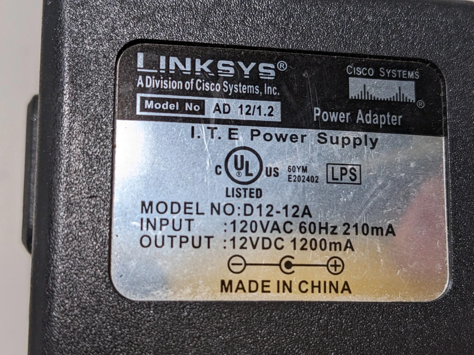 Adaptador de CA Linksys D12-12A Salida 12 V 1200 mA Fuente de alimentación AD 12 1.2 Foto 2 de 3