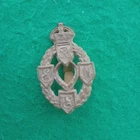 WW2 British Army Royal Electrical Mechanical Engineers Plastic Cap Badge REME