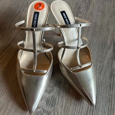 NWT Metallic Gold Nine West 3 3/4 inch Stiletto Heels with pointed toes.