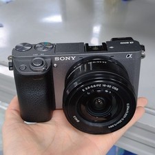 95 NEW Sony Alpha A6000 Mirrorless Digital Camera w/16-50mm Lens Charger Battery