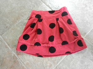 pink and black polka dot skirt