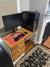 Gaming PC Setup with Monitor, Keyboard, Mouse and Desk