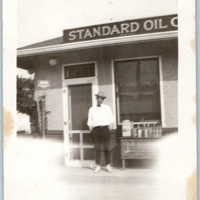c1920s Standard Oil Co Indiana Gas Station Attendant Man Snapshot Photo Oil Cans