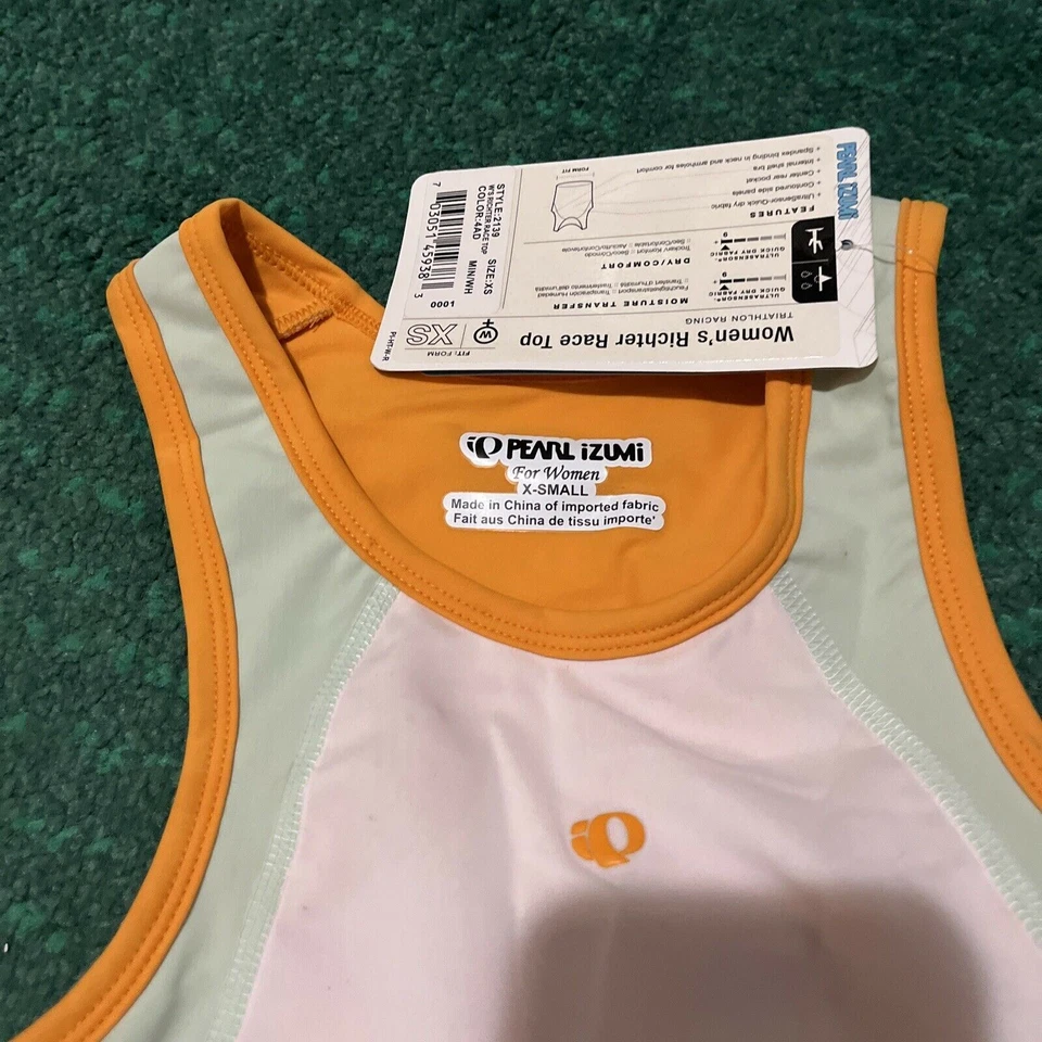 Top Richter Race Pearl Izumi para mujer blanco naranja talla X-pequeña Foto 3 de 4