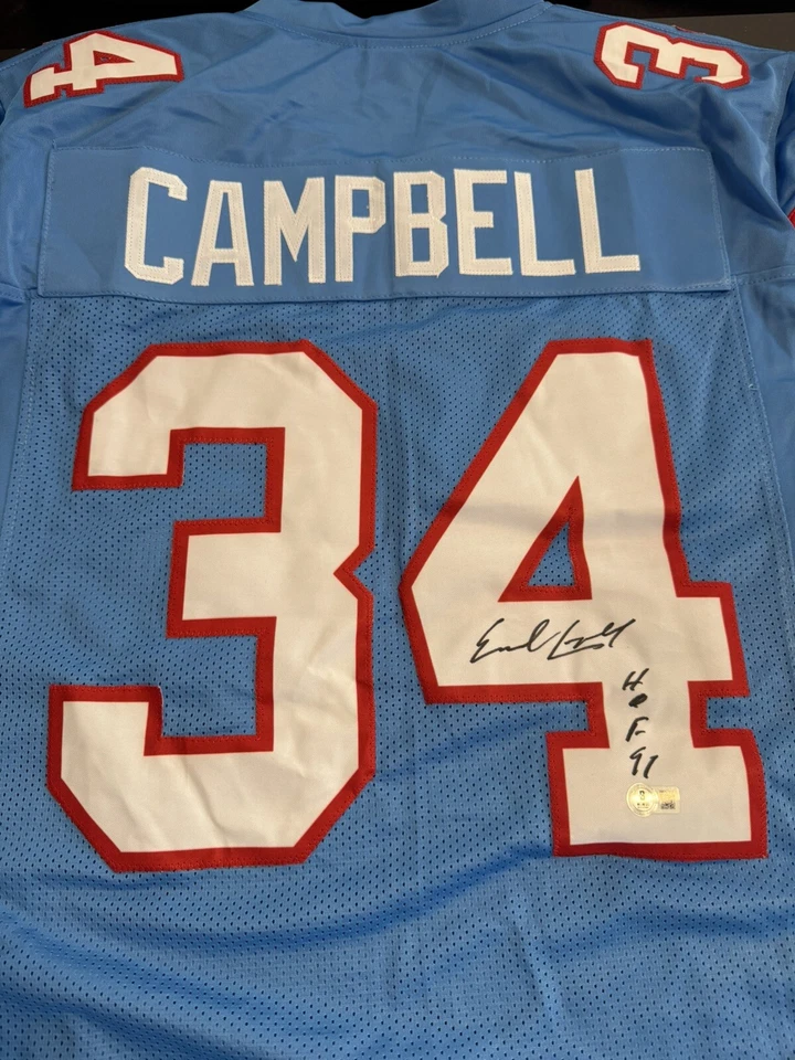CAMISETA FIRMADA POR EARL CAMPBELL INSCRITA "HOF 91" Foto 3 de 4