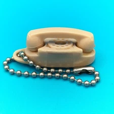 The Princess Phone Keychain Vintage Tupperware Pinkish Color