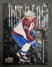 2025-26 Upper Deck Series 2 Nathan MacKinnon Dazzlers Black SSP Colorado