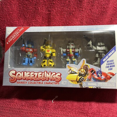 TRANSFORMERS SQUEEZLINGS SQUEEZY COLLECTIBLE CHARACTERS AUTOBOT & DECEPTION