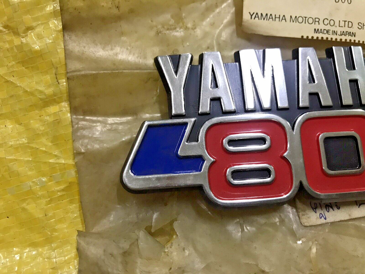 Yamaha MATE 80 Y80 V80 Front Leg Shield Emblem NOS Genuine Japan