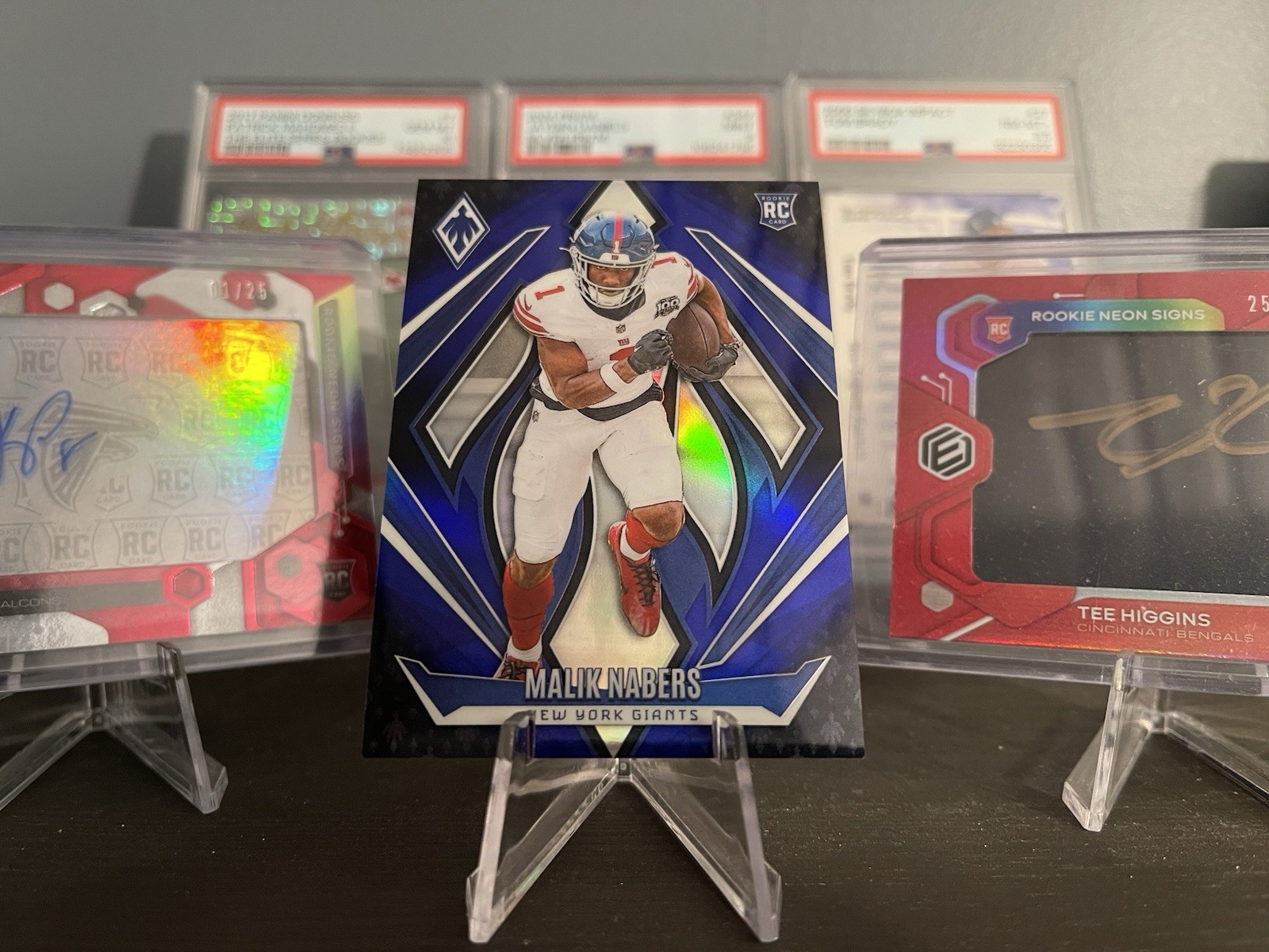 2024 Panini Phoenix - Rookies Malik Nabers #221 Blue Fade /249 (RC)