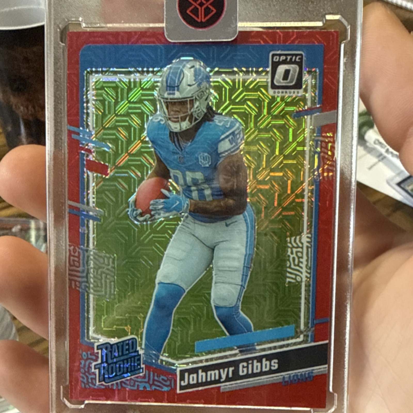 Panini 2023 Donruss Optic Rated Rookie Jahmyr Gibbs #236 Mojo Red Detroit Lions