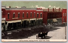 Postcard DeVoe Street looking North, Lone Tree Iowa O31