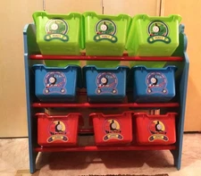 Colorful toy organizer with bins featuring Thomas, Percy, and James. 