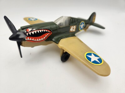 Vintage Tootsietoy Fighter Airplane. Shark face. Hard Plastic. 6.5 Wing Span.