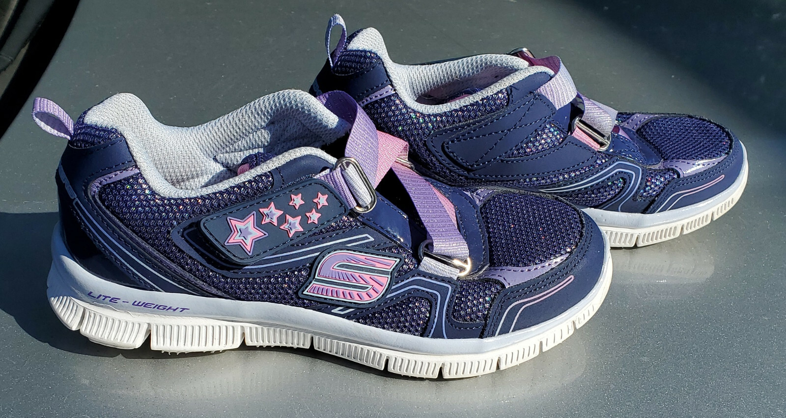 girls navy sketchers
