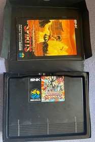 Neo Geo console, 2 controllers, 5 ROM cartridges, and 1 memory card.Tested 