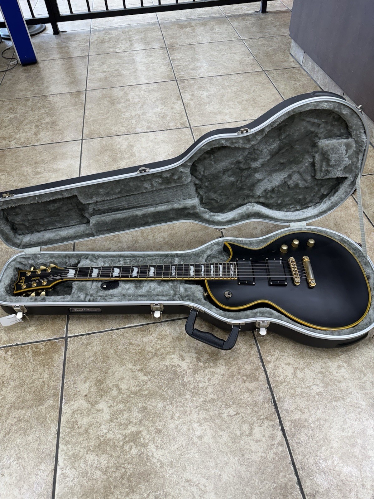 ESP LTD EC-1000 Deluxe Electric Guitar. Matte Black/Gold. 