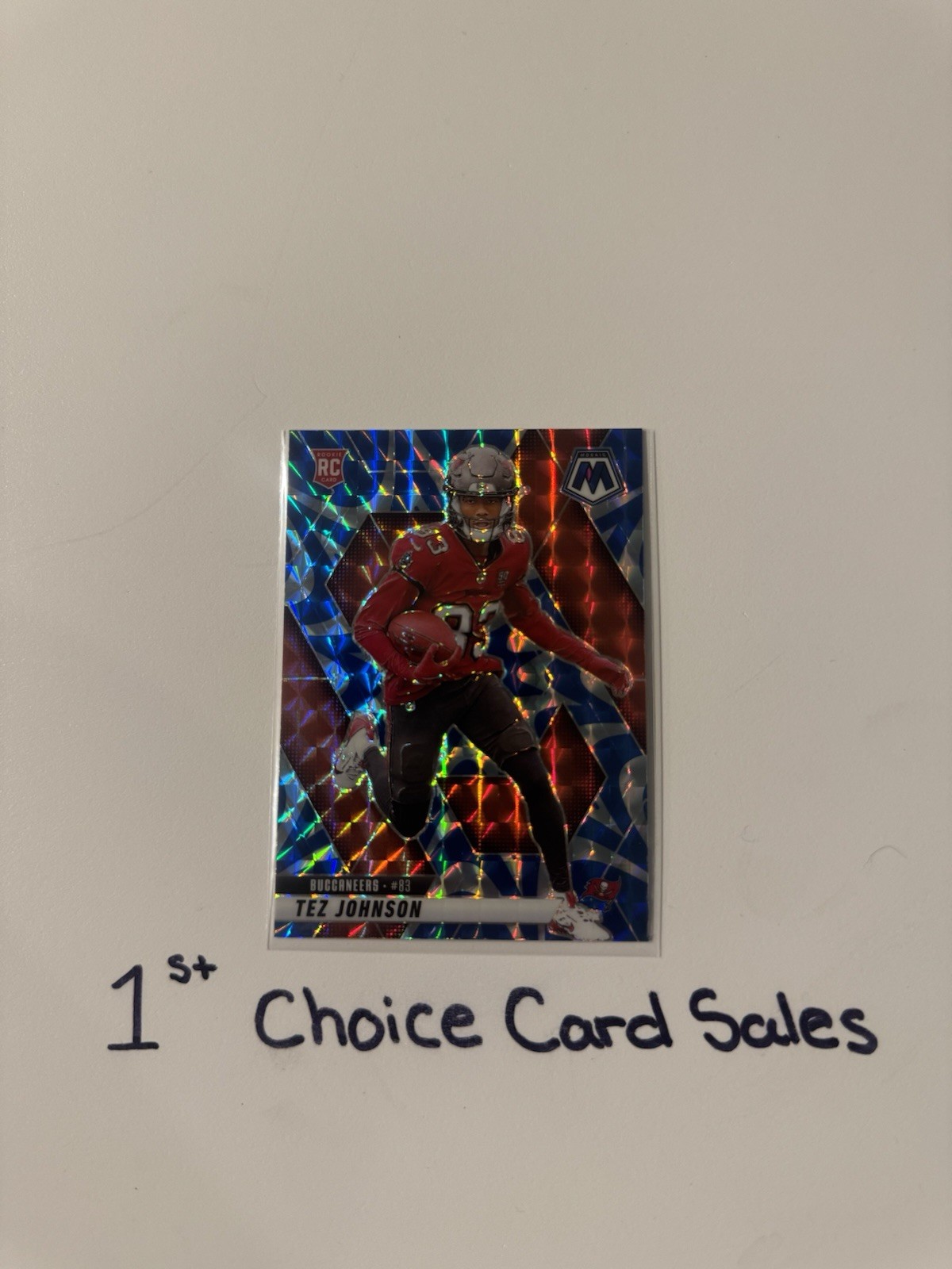 2025 Panini Mosaic Football Reactive Blue Prizm Rookie RC #316 - Tez Johnson