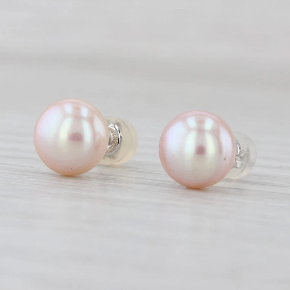Aretes solitarios redondos de oro blanco de 14 k de perlas cultivadas rosas de 8,2 mm Foto 3 de 4