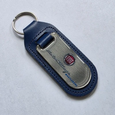 FIAT MAIN DEALER BLUE LEATHER AND METAL KEYRING FOB. MOTOR VILLAGE MARYLEBONE. - Image 1 of 3