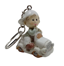 PORTACHIAVI AUTO BOMBONIERA   in resina  battesimo compleanno nascita comunione