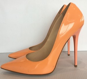 bright orange pumps