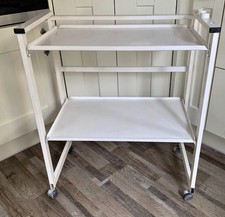 White Caci Trolley. Foldable. Folds away flat