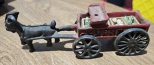 Cast Iron Black Goat Pulling Red Express Wagon Toy