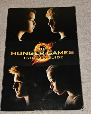 THE HUNGER GAMES TRIBUTE GUIDE Emily Seife Scholastic Inc. Illustrated Paperback