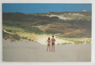 Postcard....Sunbathing Couple Admiring the Sand Dunes of Cape Cod, Massachusetts